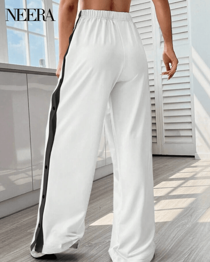 Trousers with side buttons and stripes