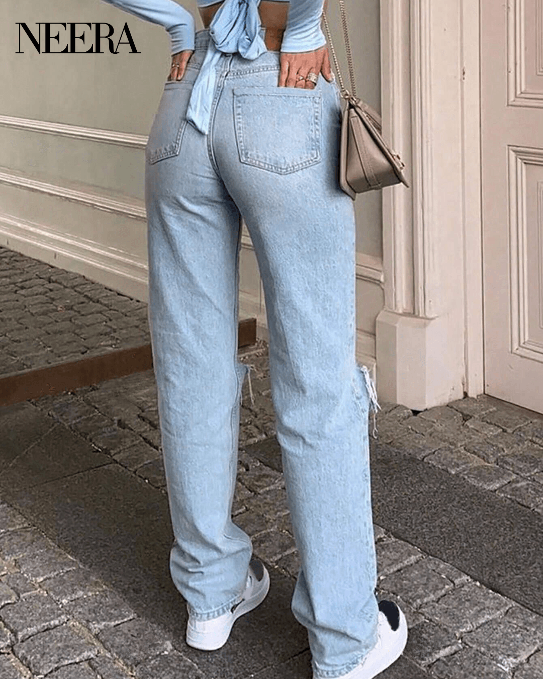 Wide leg high waist jeans with knee tear