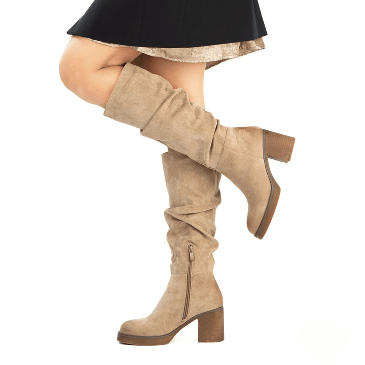 Tiny suede boots with soft shaft and comfortable heel