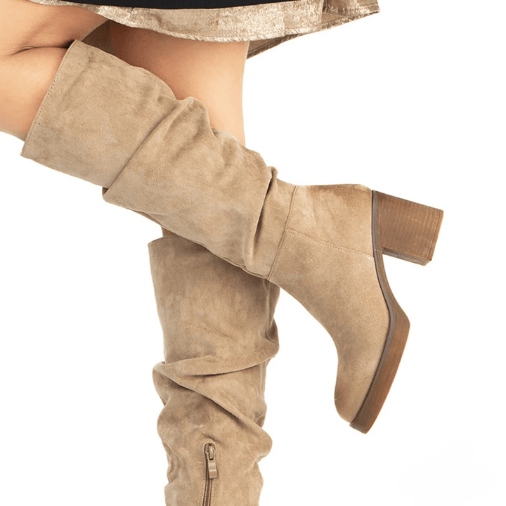 Tiny suede boots with soft shaft and comfortable heel